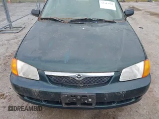 1999 Mazda Protege DX z VIN JM1BJ2222X0151674, wystawiony jako IAAI lot #42444584 z przebiegiem 219 862 mil mil oraz . Historia ofert i sprzedaży dostępna na DreamBid. Obrazek 6.