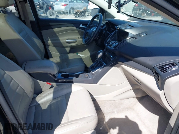 2014 Ford Escape Titanium with VIN 1FMCU9JX2EUA96338, listed as a IAAI auction lot 41806850 with 127,745 mi miles. Bid and sale history available at carsss.com. Image 5.