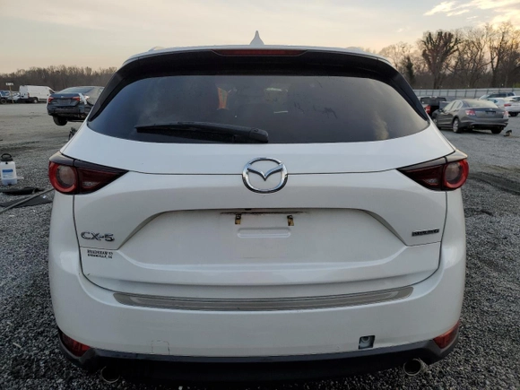 2020 Mazda CX-5 Touring with VIN JM3KFACM0L0863937, listed as a Copart auction lot 48240655 with 70,592 mi miles and Salvage Title. Bid and sale history available at carsss.com. Image 6.