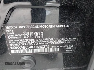2014 BMW 5 Series 535d with VIN WBAXA5C59ED690375, listed as a IAAI auction lot 42030902 with 70,553 mi miles and . Bid and sale history available at carsss.com. Image 9.