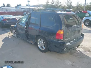 2007 GMC Envoy Denali with VIN 1GKET63M072227691, listed as a IAAI auction lot 41612371 with 154,001 mi miles. Bid and sale history available at carsss.com. Image 3.