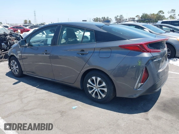 2021 Toyota Prius LE with VIN JTDKAMFPXM3170372, listed as a IAAI auction lot 42661609 with 47,977 mi miles and . Bid and sale history available at DreamBid. Image 3.