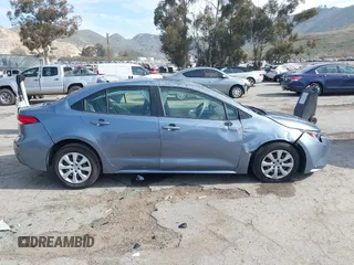 2023 Toyota Corolla LE with VIN JTDB4MEE7P3009635, listed as a IAAI auction lot 41808167 with 22,773 mi miles and . Bid and sale history available at DreamBid. Image 13.
