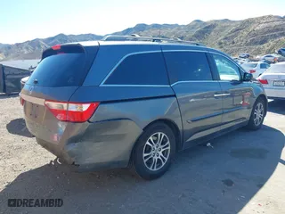 2011 Honda Odyssey EX-L with VIN 5FNRL5H68BB092628, listed as a IAAI auction lot 41820351 with 243,538 mi miles. Bid and sale history available at carsss.com. Image 4.