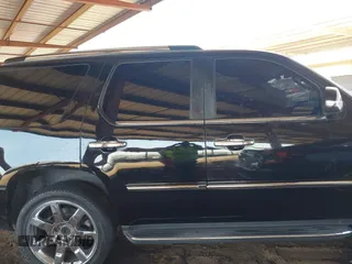 2009 Cadillac Escalade z VIN 1GYFC23269R251960, wystawiony jako IAAI lot #41993963 z przebiegiem 164 055 mil mil oraz . Historia ofert i sprzedaży dostępna na DreamBid. Obrazek 13.