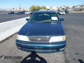 1998 Toyota Avalon XL with VIN 4T1BF18BXWU267131, listed as a IAAI auction lot 41518513 with 208,023 mi miles and . Bid and sale history available at DreamBid. Image 6.