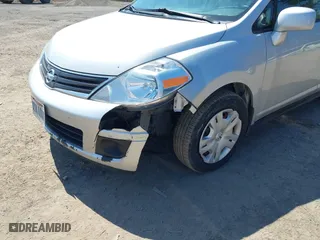 2012 Nissan Versa S with VIN 3N1BC1CP1CK269395, listed as a IAAI auction lot 42049078 with 129,091 mi miles. Bid and sale history available at carsss.com. Image 6.