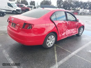 2014 Volkswagen Jetta Sedan SE with VIN 3VWD17AJ4EM293336, listed as a IAAI auction lot 41788438 with 138,128 mi miles. Bid and sale history available at carsss.com. Image 4.