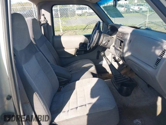 1996 Ford Ranger XL with VIN 1FTCR10A8TTA22056, listed as a IAAI auction lot 42062984 with 215,030 mi miles and . Bid and sale history available at DreamBid. Image 5.