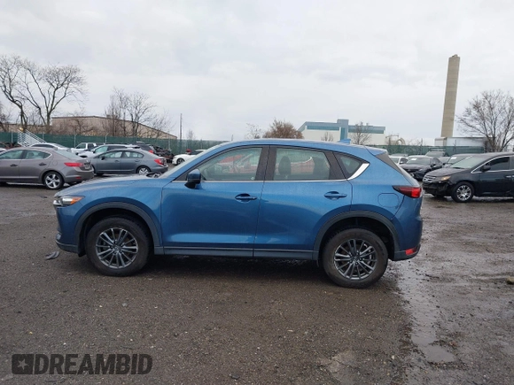 2019 Mazda CX-5 Sport with VIN JM3KFBBM5K0668678, listed as a IAAI auction lot 41811146 with 102,634 mi miles and . Bid and sale history available at DreamBid. Image 14.