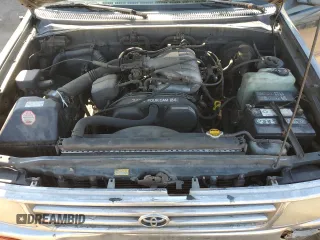 1995 Toyota T100 z VIN JT4VD22F4S0006698, wystawiony jako Copart lot #76022924 z przebiegiem 457 624 mil mil oraz Tytuł czysty. Historia ofert i sprzedaży dostępna na DreamBid. Obrazek 11.
