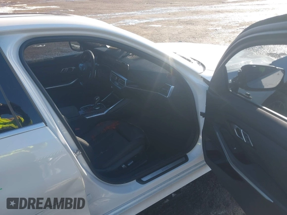 2021 BMW 3 Series 330i xDrive with VIN WBA5R7C05MFL03288, listed as a IAAI auction lot 41492559 with 47,170 mi miles and . Bid and sale history available at DreamBid. Image 5.