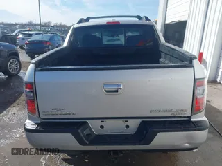 2014 Honda Ridgeline RTL z VIN 5FPYK1F51EB012843, wystawiony jako IAAI lot #41629002 z przebiegiem 114 761 mil mil oraz . Historia ofert i sprzedaży dostępna na DreamBid. Obrazek 16.