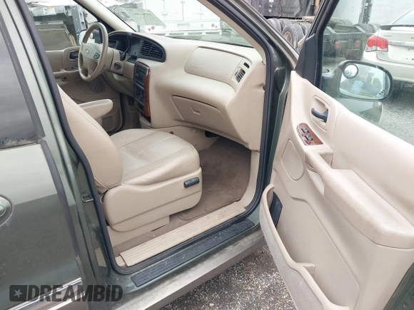 2003 Ford Windstar SEL z VIN 2FMZA53483BB41431, wystawiony jako IAAI lot #41704907 z przebiegiem 125 245 mil mil oraz . Historia ofert i sprzedaży dostępna na DreamBid. Obrazek 5.