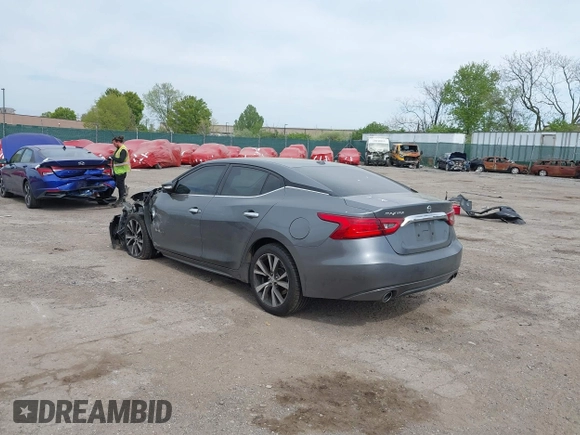 2018 Nissan Maxima SV with VIN 1N4AA6AP4JC377985, listed as a IAAI auction lot 42071678 with 104,326 mi miles and . Bid and sale history available at DreamBid. Image 3.