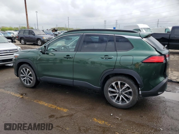 2022 Toyota Corolla Cross XLE with VIN 7MUDAABG6NV006829, listed as a Copart auction lot 55626965 with 23,187 mi miles and Salvage title. Bid and sale history available at DreamBid. Image 2.