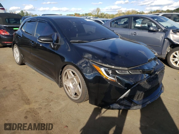2022 Toyota Corolla Hatchback SE with VIN JTND4MBEXN3180370, listed as a Copart auction lot 74436644 with 57,563 mi miles and Salvage Title. Bid and sale history available at carsss.com. Image 4.