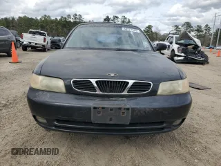 1999 Daewoo Nubira CDX z VIN KLAJB82Z5XK301054, wystawiony jako Copart lot #48227355 z przebiegiem 66 730 mil mil oraz Szkody całkowita. Historia ofert i sprzedaży dostępna na DreamBid. Obrazek 5.