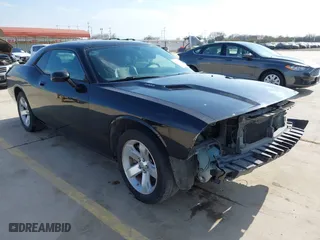 2009 Dodge Challenger R/T with VIN 2B3LJ54T19H605389, listed as a IAAI auction lot 41554282 with 121,944 mi miles. Bid and sale history available at carsss.com. Image 1.