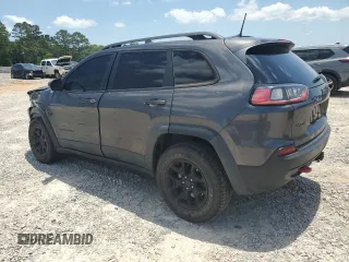 2019 Jeep Cherokee Trailhawk с VIN 1C4PJMBX5KD278692, выставлен на аукционе Copart как лот 56912285 с пробегом 110 964 миль миль и Списание • Salvage title. История ставок и продаж доступна на DreamBid. Изображение 2.