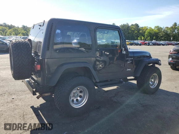 2001 Jeep Wrangler Sport with VIN 1J4FA49S21P339042, listed as a Copart auction lot 56922555 with 113,315 mi miles and Salvage title. Bid and sale history available at DreamBid. Image 3.