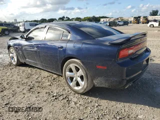 2013 Dodge Charger RT with VIN 2C3CDXCT0DH729721, listed as a Copart auction lot 77606344 with 93,408 mi miles and Salvage Title. Bid and sale history available at carsss.com. Image 2.