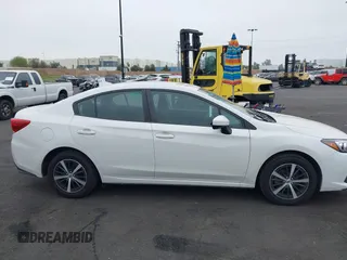 2021 Subaru Impreza Premium with VIN 4S3GKAV61M3604298, listed as a IAAI auction lot 42011198 with 50,667 mi miles and . Bid and sale history available at DreamBid. Image 14.
