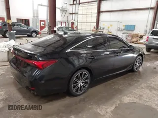 2019 Toyota Avalon XLE with VIN 4T1BZ1FB6KU014330, listed as a IAAI auction lot 41360733 with 67,499 mi miles and . Bid and sale history available at DreamBid. Image 4.