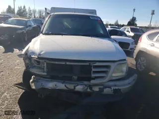 1999 Ford F-150 Work Series with VIN 1FTRF17W9XKB35000, listed as a Copart auction lot 86001964 with 155,055 mi miles and Salvage Title. Bid and sale history available at carsss.com. Image 5.