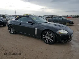 2007 Jaguar XK XKR with VIN SAJWA44C879B19251, listed as a Copart auction lot 50807595 with 100,715 mi miles and Salvage Title. Bid and sale history available at DreamBid. Image 4.