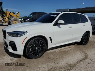 2021 BMW X5 xDrive40i with VIN 5UXCR6C00M9F95436, listed as a Copart auction lot 63815355 with 97,707 mi miles and Clean title. Bid and sale history available at DreamBid. Image 1.