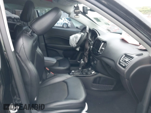 2021 Jeep Compass Latitude with VIN 3C4NJDBB6MT590092, listed as a IAAI auction lot 42351097 with 72,428 mi miles and . Bid and sale history available at DreamBid. Image 5.