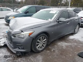2015 Infiniti Q50 Premium with VIN JN1BV7AR0FM396192, listed as a IAAI auction lot 41564677 with 210,460 mi miles and . Bid and sale history available at DreamBid. Image 18.