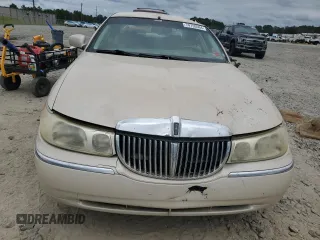 2001 Lincoln Town Car Cartier L z VIN 1LNHM85W61Y640344, wystawiony jako Copart lot #74755564 z przebiegiem Nie podano mil oraz Szkoda całkowita • Salvage title. Historia ofert i sprzedaży dostępna na DreamBid. Obrazek 5.