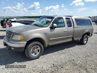 2002 Ford F-150 XL z VIN 1FTRX18L52NB25220, wystawiony jako Copart lot #58202165 z przebiegiem 298 885 mil mil oraz Szkoda całkowita • Salvage title. Historia ofert i sprzedaży dostępna na DreamBid. Obrazek 1.
