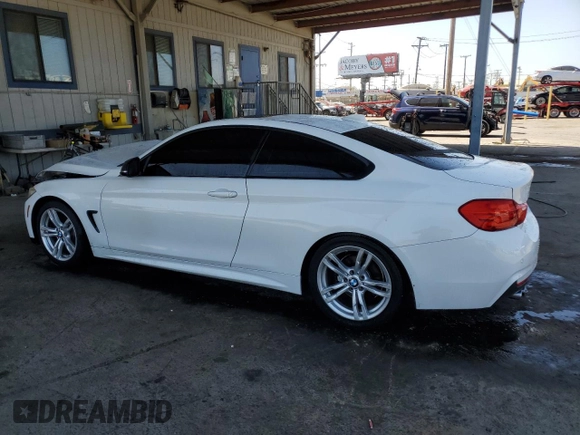 2014 BMW 4 Series 428i with VIN WBA3N3C57EF711803, listed as a Copart auction lot 57856695 with 68,905 mi miles and Salvage title. Bid and sale history available at DreamBid. Image 2.