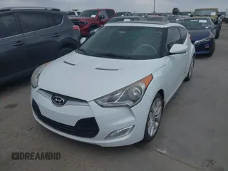 2013 Hyundai Veloster w/Black Int с VIN KMHTC6AD5DU166601, выставлен на аукционе IAAI как лот 42182995 с пробегом 143 106 миль миль и . История ставок и продаж доступна на DreamBid. Изображение 2.