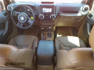 2013 Jeep Wrangler Unlimited Rubicon with VIN 1C4HJWFG3DL589847, listed as a Copart auction lot 52641075 with 75,747 mi miles and Salvage Title. Bid and sale history available at carsss.com. Image 8.