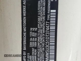 2013 MINI Hardtop with VIN WMWSU3C51DT374477, listed as a Copart auction lot 62654295 with 127,295 mi miles and Salvage title. Bid and sale history available at DreamBid. Image 12.