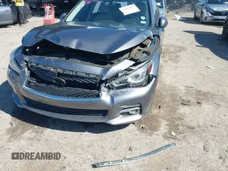 2015 Infiniti Q50 Premium z VIN JN1BV7AR9FM408386, wystawiony jako IAAI lot #42084887 z przebiegiem 122 527 mil mil oraz . Historia ofert i sprzedaży dostępna na DreamBid. Obrazek 6.