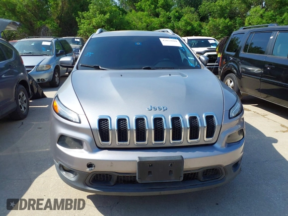 2014 Jeep Cherokee Latitude with VIN 1C4PJMCB4EW315520, listed as a IAAI auction lot 42034989 with 215,758 mi miles and . Bid and sale history available at DreamBid. Image 12.