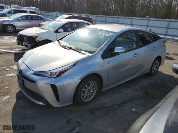 2021 Toyota Prius L Eco with VIN JTDKAMFU3M3147845, listed as a Copart auction lot 88705855 with 59,418 mi miles and Salvage Title. Bid and sale history available at carsss.com. Image 1.