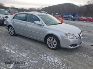2009 Toyota Avalon XL with VIN 4T1BK36B69U329378, listed as a IAAI auction lot 41387338 with 163,023 mi miles. Bid and sale history available at carsss.com. Image 1.