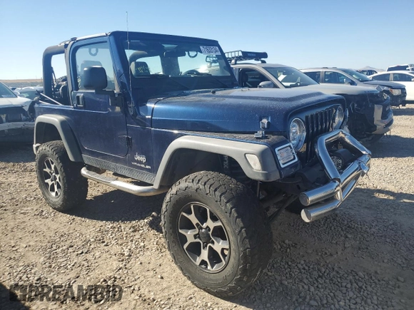 2005 Jeep Wrangler SE with VIN 1J4FA29S65P330905, listed as a Copart auction lot 71633134 with 77,598 mi miles and Salvage Title. Bid and sale history available at carsss.com. Image 4.