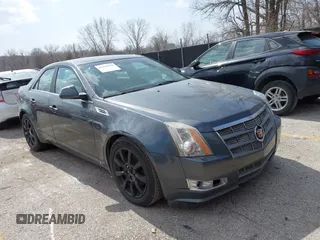 2009 Cadillac CTS RWD w/1SA with VIN 1G6DF577790133127, listed as a IAAI auction lot 41810358 with 220,278 mi miles. Bid and sale history available at carsss.com. Image 1.