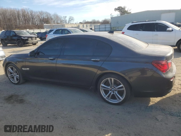 2015 BMW 7 Series 750Li with VIN WBAYE8C59FD780945, listed as a Copart auction lot 42730625 with 0 mi miles and Salvage Title. Bid and sale history available at carsss.com. Image 2.