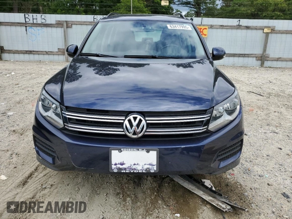 2015 Volkswagen Tiguan SE z VIN WVGAV7AX9FW611978, wystawiony jako Copart lot #63417995 z przebiegiem 77 942 mil mil oraz Czysty tytuł • Clean title. Historia ofert i sprzedaży dostępna na DreamBid. Obrazek 5.