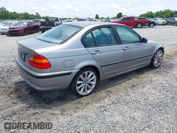 2003 BMW 3 Series 325i with VIN WBAET374X3NJ35921, listed as a IAAI auction lot 42321401 with 209,483 mi miles and . Bid and sale history available at DreamBid. Image 4.