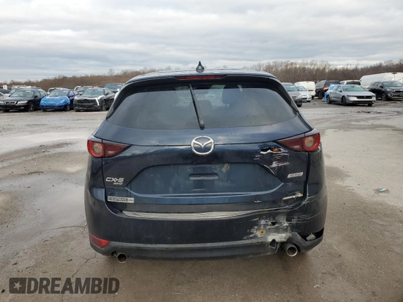 2019 Mazda CX-5 Touring with VIN JM3KFBCM2K0570710, listed as a Copart auction lot 85688164 with 81,121 mi miles and Salvage Title. Bid and sale history available at carsss.com. Image 6.