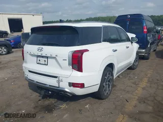 2022 Hyundai Palisade Calligraphy with VIN KM8R7DHE5NU418978, listed as a IAAI auction lot 40421814 with 54,357 mi miles. Bid and sale history available at carsss.com. Image 4.